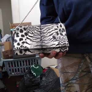 I'm selling some purses and a book bag.